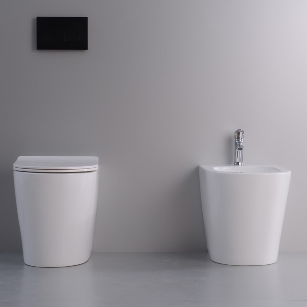 Wc e bidet a pavimento filo muro ceramica bianco lucido Roundy