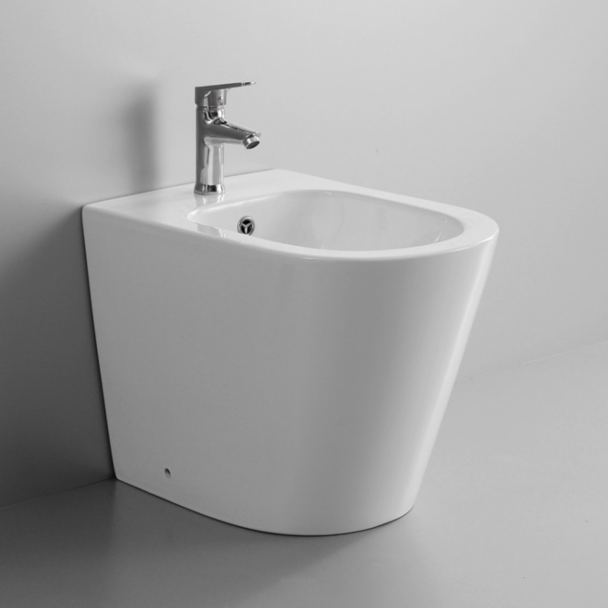 Bidet monoforo a pavimento filo muro ceramica bianco lucido Roundy