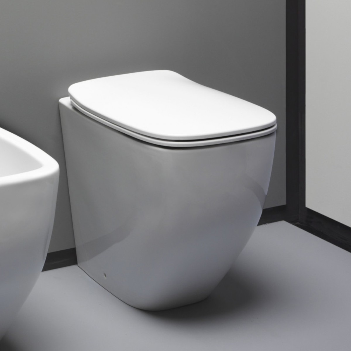 wc rimless a pavimento filo muro ceramica bianco lucido Newram