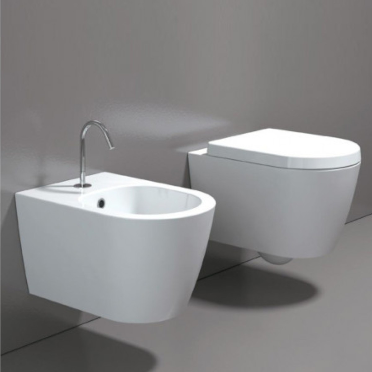 wc rimless e bidet sospesi moderni installazione a muro ceramica bianco lucido con coprivaso Landra