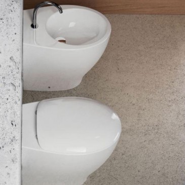 wc rimless con coprivaso e bidet monoforo a pavimento filo muro ceramica bianco lucido Comfy Slim